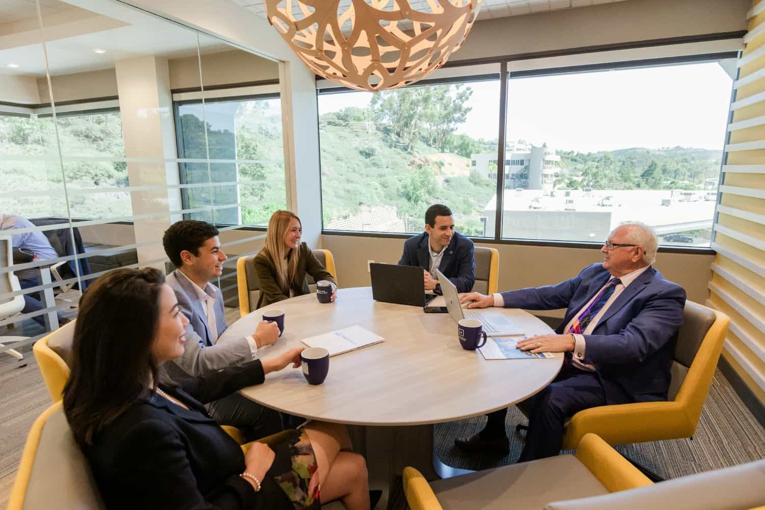 Employees at WestPac Wealth Partners meet with a mentor.